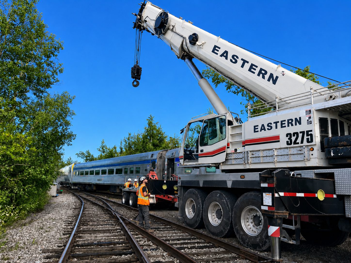 Eastern Crane Rentals large mobile crane set up beside rail infrastructure
